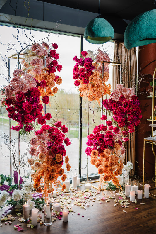 metal wedding stands decorated with flowers
