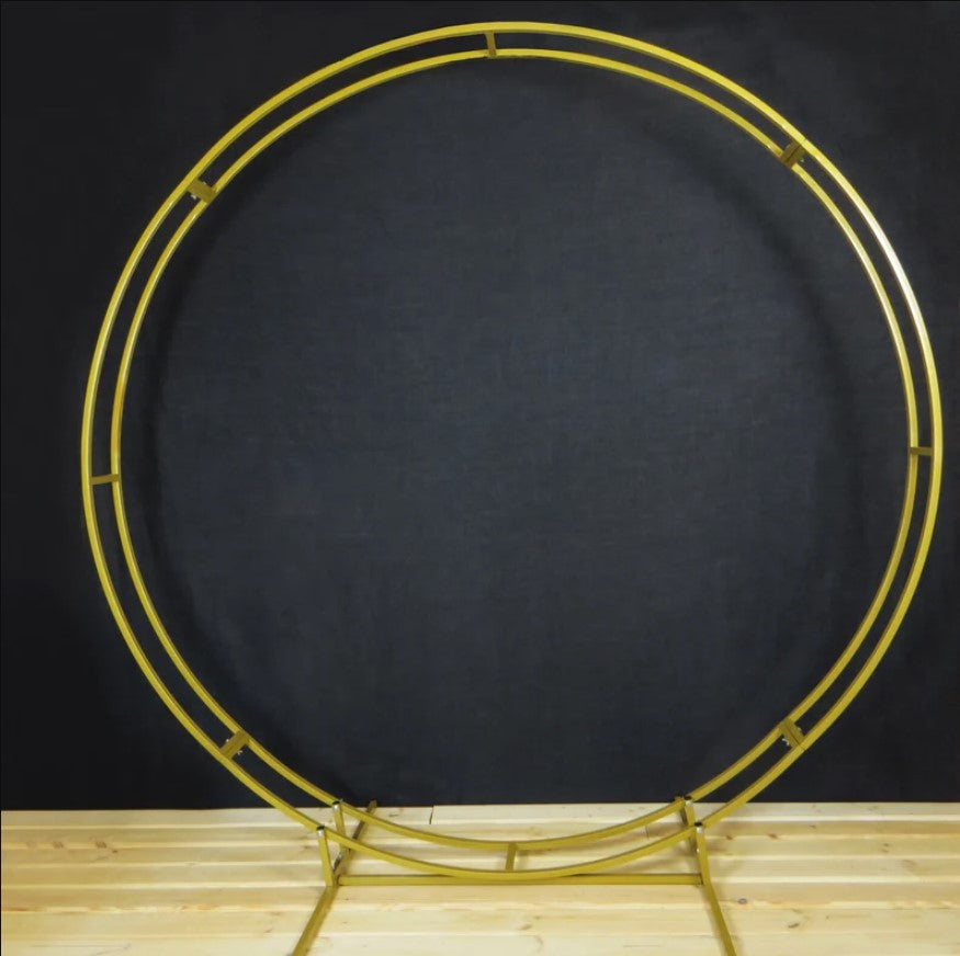 Gold circular metal frame on a black background